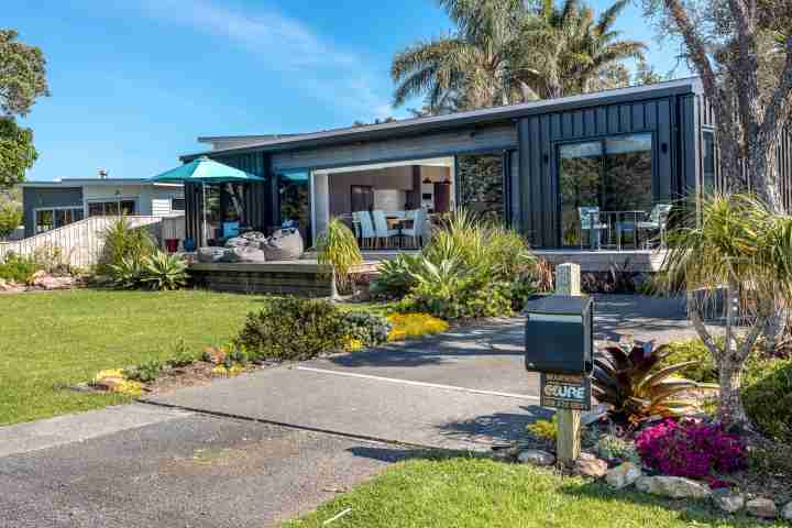 Front of the house at Piritahi Beach House by Waiheke Unlimited