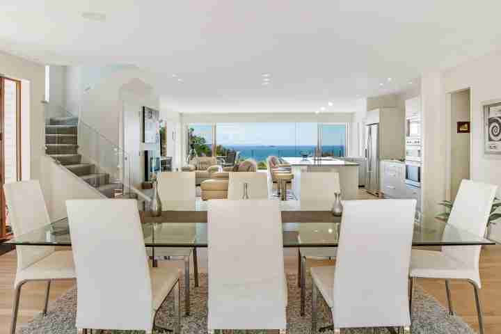 Entertain guests and family with large dining table in modern Waiheke Villa