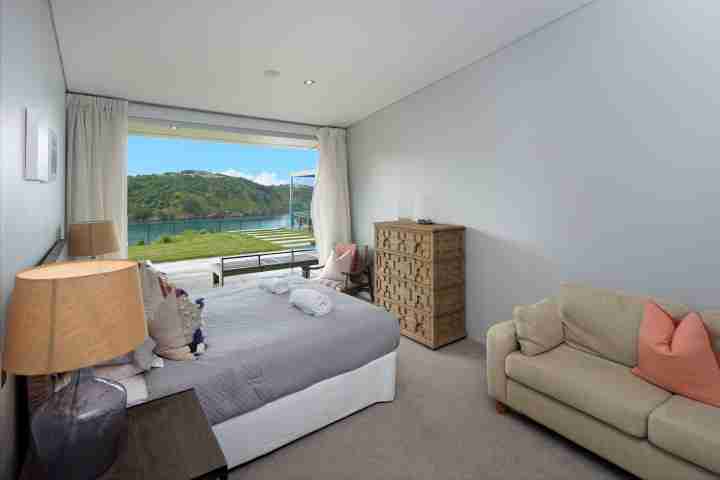 Stay in private luxury double bedroom with views of garden, sea and tennis court