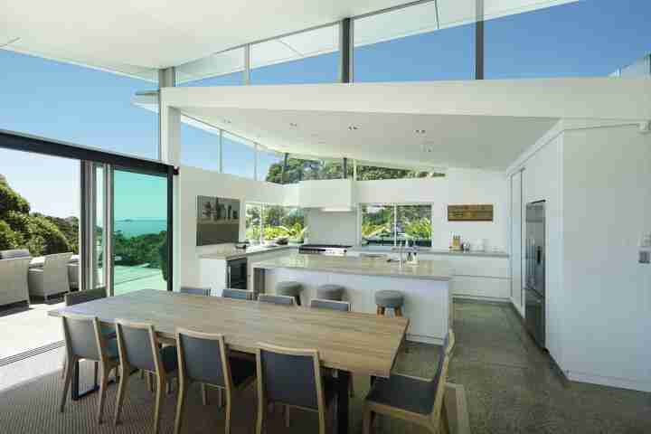 Entertain guests with open-plan kitchen and dining area and indoor outdoor flow at Korora Estate
