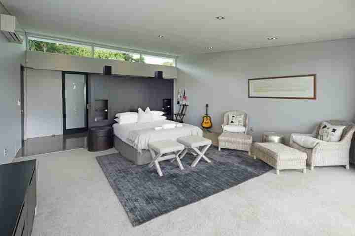 Stay in spacious comfortable master bedroom at private luxury Waiheke Island estate