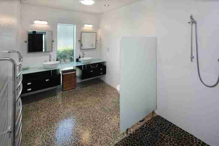 Walk in shower and twin sinks of master ensuite in private Waiheke Island estate