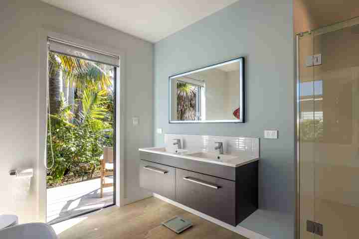 Master bathroom ensuite at Piritahi Beach House by Waiheke Unlimited