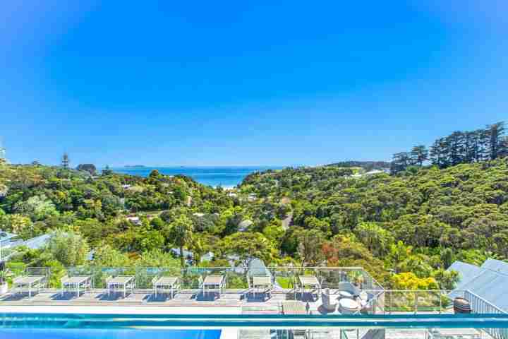Relax and enjoy family time, experience the sunny, large outdoor swimming pool at the Waiheke Island Resort