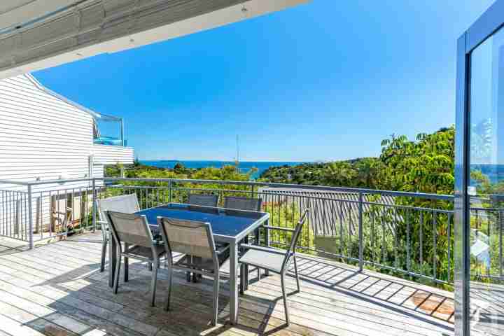 Experience Waiheke with unlimited sea views from private deck and outdoor dining area